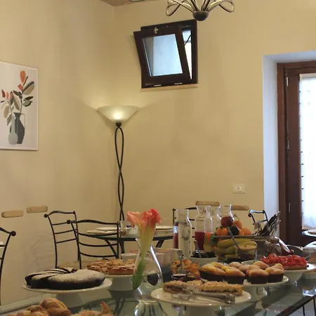 Il Bottone D'argento Couette-café 4*